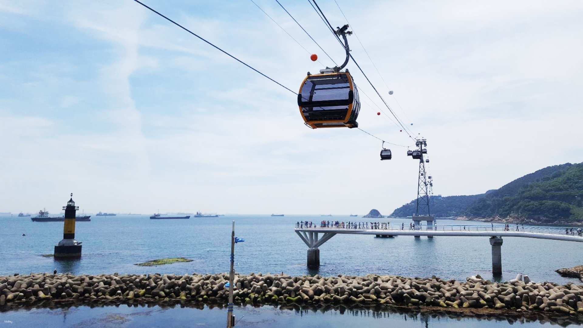 Experience breathtaking views as you glide above the coastline in the Songdo Marine Cable Car offering an unforgettable perspective of Busan's scenic shores and vibrant marine life.